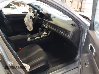 2023 Honda Civic Sport with VIN 19XFL2H80PE010679, listed as a IAAI auction lot 42026973 with 25,701 mi miles and . Bid and sale history available at DreamBid. Image 5.