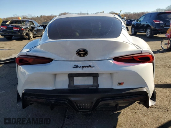 2021 Toyota Supra 3.0 с VIN WZ1DB0C02MW042827, выставлен на аукционе Copart как лот 81323404 с пробегом 35 466 миль миль и Списание • Salvage title. История ставок и продаж доступна на DreamBid. Изображение 6.