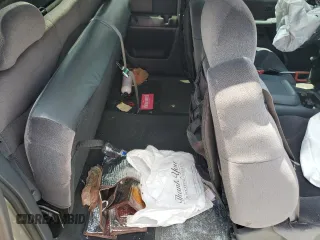 2001 GMC Sierra 1500 SLE z VIN 2GTEC19TX11393656, wystawiony jako Copart lot #56097465 z przebiegiem 133 629 mil mil oraz Szkoda całkowita • Salvage title. Historia ofert i sprzedaży dostępna na DreamBid. Obrazek 10.