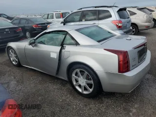 2004 Cadillac XLR z VIN 1G6YV34A545602056, wystawiony jako Copart lot #66506514 z przebiegiem Nie podano mil oraz Nie do naprawy. Historia ofert i sprzedaży dostępna na DreamBid. Obrazek 2.