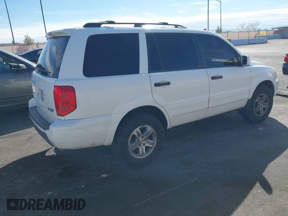 2005 Honda Pilot EX-L with RES with VIN 2HKYF18635H531493, listed as a IAAI auction lot 41756705 with 190,916 mi miles. Bid and sale history available at carsss.com. Image 4.