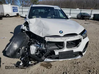 2021 BMW X1 xDrive28i with VIN WBXJG9C07M5U27350, listed as a Copart auction lot 48637295 with 22,202 mi miles and Salvage Title. Bid and sale history available at carsss.com. Image 5.