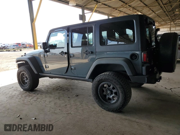 2014 Jeep Wrangler Unlimited Rubicon with VIN 1C4BJWFG4EL141706, listed as a Copart auction lot 51305235 with 106,919 mi miles and Salvage Title. Bid and sale history available at carsss.com. Image 2.