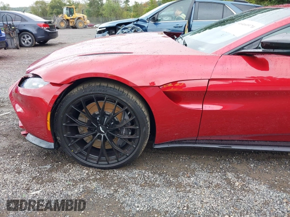 2023 Aston Martin Vantage z VIN SCFSMGAW8PGN08275, wystawiony jako IAAI lot #40460970 z przebiegiem 2 602 mil mil oraz . Historia ofert i sprzedaży dostępna na DreamBid. Obrazek 19.
