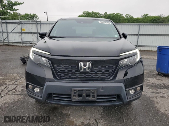2021 Honda Passport EX-L z VIN 5FNYF8H50MB004444, wystawiony jako Copart lot #56404505 z przebiegiem 77 547 mil mil oraz Szkoda całkowita • Salvage title. Historia ofert i sprzedaży dostępna na DreamBid. Obrazek 5.