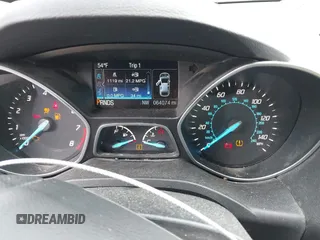 2014 Ford Escape SE z VIN 1FMCU9GX8EUB98766, wystawiony jako IAAI lot #42256143 z przebiegiem 64 074 mil mil oraz . Historia ofert i sprzedaży dostępna na DreamBid. Obrazek 7.