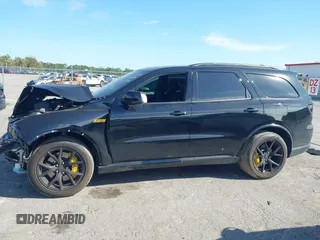 2024 Dodge Durango SRT 392 Premium with VIN 1C4SDJGJ6RC221616, listed as a IAAI auction lot 41280570 with 2,169 mi miles and . Bid and sale history available at DreamBid. Image 14.