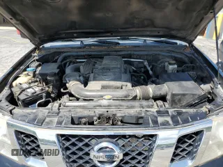 2010 Nissan Frontier Pro-4X z VIN 1N6AD0EV4AC423903, wystawiony jako Copart lot #56483965 z przebiegiem 170 442 mil mil oraz Szkoda całkowita • Salvage title. Historia ofert i sprzedaży dostępna na DreamBid. Obrazek 11.