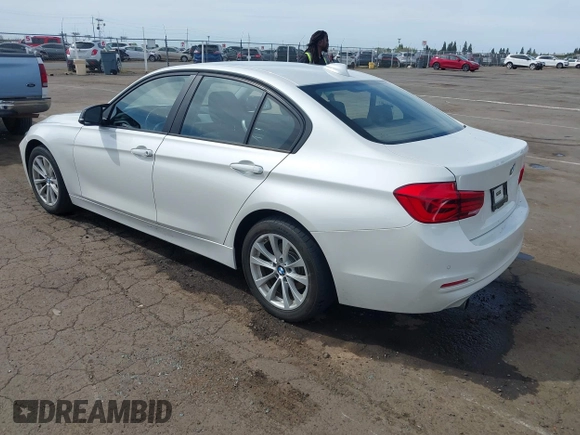 2016 BMW 3 Series 320i with VIN WBA8A9C52GK617133, listed as a IAAI auction lot 42029140 with 59,113 mi miles. Bid and sale history available at carsss.com. Image 3.
