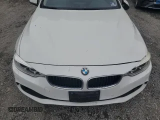 2015 BMW 4 Series 428i xDrive z VIN WBA3N9C59FK246615, wystawiony jako Copart lot #58202885 z przebiegiem 98 570 mil mil oraz Szkoda całkowita • Salvage title. Historia ofert i sprzedaży dostępna na DreamBid. Obrazek 11.