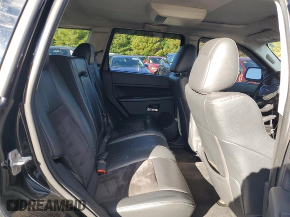 2008 Jeep Grand Cherokee SRT-8 with VIN 1J8HR78368C152318, listed as a Copart auction lot 74203604 with 157,840 mi miles and Salvage Title. Bid and sale history available at carsss.com. Image 11.