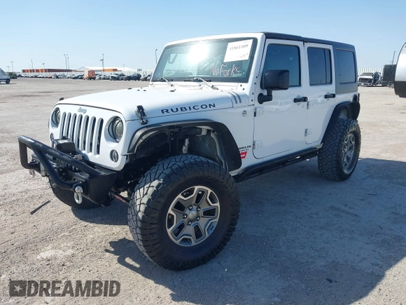 2014 Jeep Wrangler Unlimited Rubicon with VIN 1C4BJWFG1EL167423, listed as a IAAI auction lot 41861109 with 104,669 mi miles. Bid and sale history available at carsss.com. Image 18.