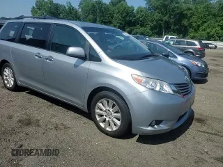 2015 Toyota Sienna Limited with VIN 5TDDK3DC4FS111836, listed as a Copart auction lot 61940595 with 111,579 mi miles and Salvage title. Bid and sale history available at DreamBid. Image 14.