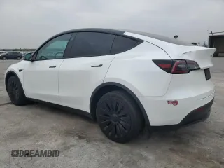 2023 Tesla Model Y Long Range with VIN 7SAYGDEE2PF860135, listed as a Copart auction lot 50380975 with 25,334 mi miles and Salvage Title. Bid and sale history available at DreamBid. Image 2.