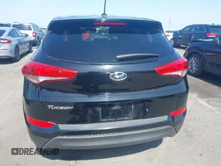 2016 Hyundai Tucson SE z VIN KM8J23A46GU125424, wystawiony jako IAAI lot #42349510 z przebiegiem 112 133 mil mil oraz . Historia ofert i sprzedaży dostępna na DreamBid. Obrazek 16.
