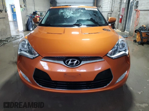 2012 Hyundai Veloster w/Gray Int z VIN KMHTC6AD4CU023265, wystawiony jako Copart lot #54959585 z przebiegiem 130 115 mil mil oraz Czysty tytuł • Clean title. Historia ofert i sprzedaży dostępna na DreamBid. Obrazek 5.