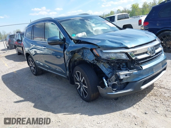 2020 Honda Pilot Touring 8-Passenger with VIN 5FNYF6H93LB034009, listed as a IAAI auction lot 42090993 with 73,325 mi miles and . Bid and sale history available at carsss.com. Image 1.