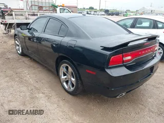 2014 Dodge Charger RT with VIN 2C3CDXCT4EH340887, listed as a IAAI auction lot 42113933 with 143,897 mi miles. Bid and sale history available at carsss.com. Image 3.