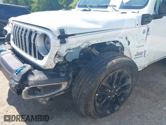 2024 Jeep Wrangler Sahara with VIN 1C4RJXP60RW292413, listed as a IAAI auction lot 42053663 with 22,808 mi miles and . Bid and sale history available at DreamBid. Image 6.