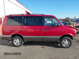 1999 Chevrolet Astro with VIN 1GNEL19W6XB104010, listed as a IAAI auction lot 41403240 with 96,904 mi miles. Bid and sale history available at carsss.com. Image 14.
