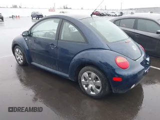 2003 Volkswagen New Beetle Coupe GL with VIN 3VWBK21C03M405877, listed as a IAAI auction lot 41851419 with 226,116 mi miles. Bid and sale history available at carsss.com. Image 3.