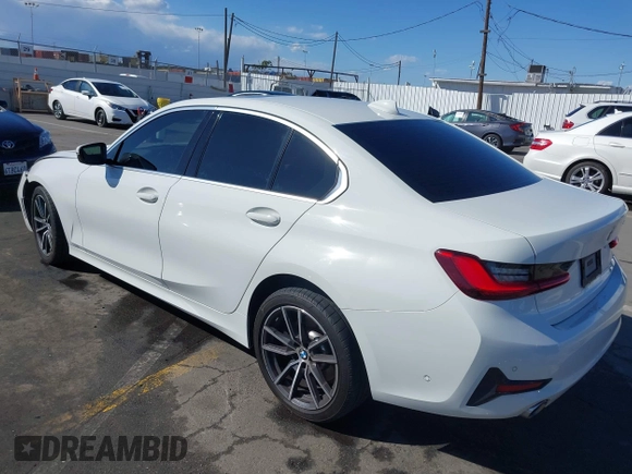 2020 BMW 3 Series 330i with VIN 3MW5R1J02L8B31552, listed as a IAAI auction lot 41760488 with 32,918 mi miles. Bid and sale history available at carsss.com. Image 3.