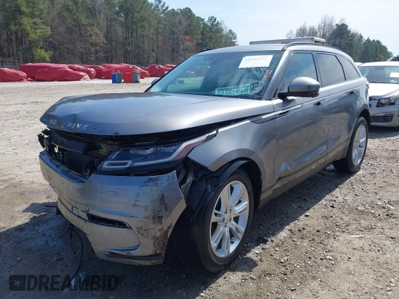 2020 Land Rover Range Rover Velar S z VIN SALYB2EX7LA259607, wystawiony jako IAAI lot #40980294 z przebiegiem 95 967 mil mil oraz . Historia ofert i sprzedaży dostępna na DreamBid. Obrazek 2.