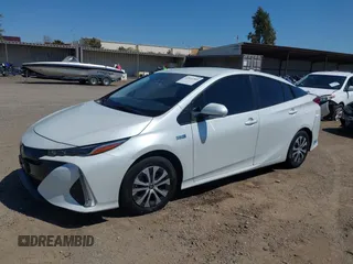 2021 Toyota Prius LE with VIN JTDKAMFP2M3184900, listed as a IAAI auction lot 42014569 with 81,563 mi miles and . Bid and sale history available at DreamBid. Image 17.