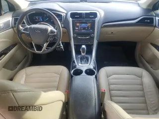 2013 Ford Fusion SE Hybrid z VIN 3FA6P0LU7DR368711, wystawiony jako Copart lot #62367685 z przebiegiem 155 284 mil mil oraz Czysty tytuł • Clean title. Historia ofert i sprzedaży dostępna na DreamBid. Obrazek 8.