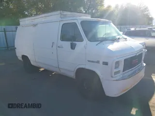 1995 GMC Vandura z VIN 1GTEG25K5SF548518, wystawiony jako IAAI lot #40664471 z przebiegiem 157 506 mil mil oraz . Historia ofert i sprzedaży dostępna na DreamBid. Obrazek 1.