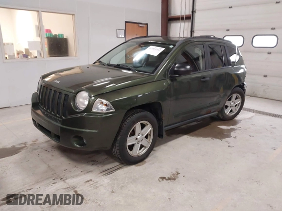 2008 Jeep Compass Sport with VIN 1J8FF47W28D534267, listed as a IAAI auction lot 42009243 with 122,720 mi miles and . Bid and sale history available at carsss.com. Image 17.
