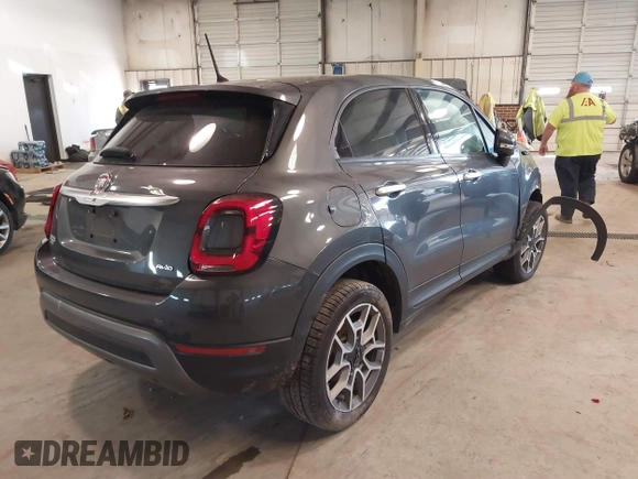 2021 FIAT 500X Trekking with VIN ZFBNF3B17MP909591, listed as a IAAI auction lot 41256551 with 58,688 mi miles and . Bid and sale history available at DreamBid. Image 4.