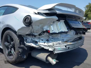 2015 Ford Mustang V6 with VIN 1FA6P8AM1F5342967, listed as a IAAI auction lot 42164817 with 106,700 mi miles and . Bid and sale history available at DreamBid. Image 6.