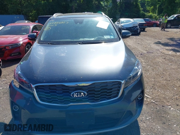 2020 Kia Sorento EX z VIN 5XYPHDA51LG706563, wystawiony jako IAAI lot #39526327 z przebiegiem 36 833 mil mil oraz . Historia ofert i sprzedaży dostępna na DreamBid. Obrazek 12.