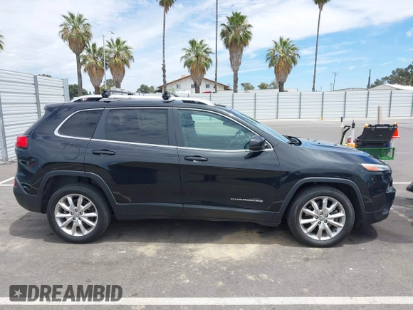 2014 Jeep Cherokee Limited z VIN 1C4PJLDB9EW162416, wystawiony jako IAAI lot #42779797 z przebiegiem 158 581 mil mil oraz . Historia ofert i sprzedaży dostępna na DreamBid. Obrazek 13.