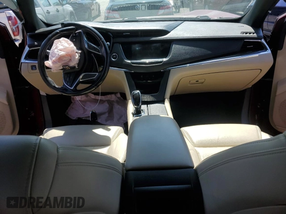 2018 Cadillac XT5 FWD with VIN 1GYKNARS1JZ205595, listed as a Copart auction lot 52428565 with 106,927 mi miles and Salvage title. Bid and sale history available at DreamBid. Image 8.