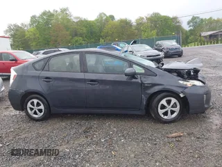2015 Toyota Prius Four z VIN JTDKN3DU2F0439833, wystawiony jako IAAI lot #42216345 z przebiegiem 96 872 mil mil oraz . Historia ofert i sprzedaży dostępna na DreamBid. Obrazek 14.