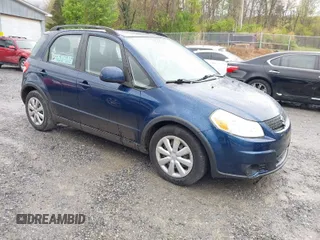2011 Suzuki SX4 Crossover with VIN JS2YB5A31B6304110, listed as a IAAI auction lot 42023959 with 127,730 mi miles. Bid and sale history available at carsss.com. Image 1.