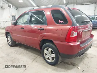 2009 Kia Sportage LX with VIN KNDJE723497555026, listed as a IAAI auction lot 42102679 with 136,398 mi miles. Bid and sale history available at carsss.com. Image 3.