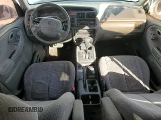 2002 Suzuki Grand Vitara JLX z VIN JS3TD62V824154031, wystawiony jako Copart lot #76403684 z przebiegiem 208 529 mil mil oraz Szkoda całkowita • Salvage title. Historia ofert i sprzedaży dostępna na DreamBid. Obrazek 8.