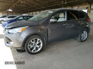 2014 Ford Escape Titanium с VIN 1FMCU0J91EUA21918, выставлен на аукционе Copart как лот 59161865 с пробегом 118 003 миль миль и Списание • Salvage title. История ставок и продаж доступна на DreamBid. Изображение 1.
