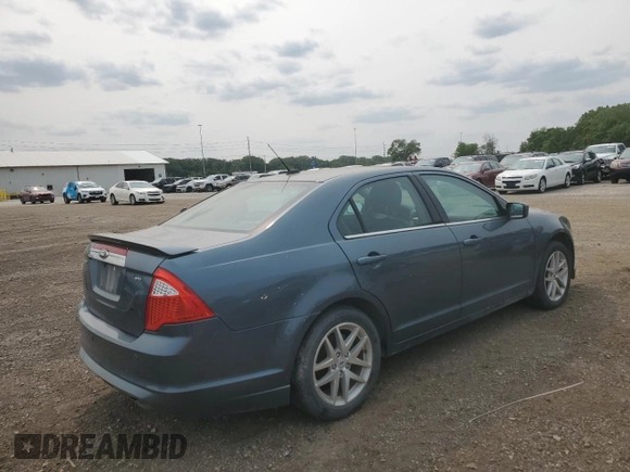 2012 Ford Fusion SEL z VIN 3FAHP0JG9CR412387, wystawiony jako Copart lot #58542715 z przebiegiem 143 112 mil mil oraz Czysty tytuł • Clean title. Historia ofert i sprzedaży dostępna na DreamBid. Obrazek 3.