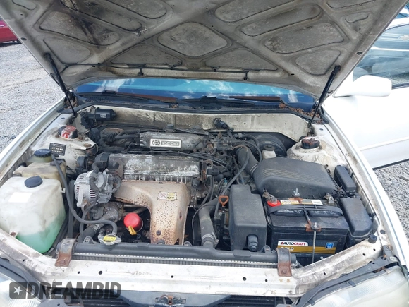 1992 Toyota Camry LE z VIN 4T1SK12E0NU021654, wystawiony jako IAAI lot #42305378 z przebiegiem 305 421 mil mil oraz . Historia ofert i sprzedaży dostępna na DreamBid. Obrazek 10.