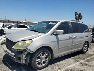 2007 Honda Odyssey Touring with VIN 5FNRL38807B032534, listed as a Copart auction lot 64029085 with 179,695 mi miles and Salvage title. Bid and sale history available at DreamBid. Image 1.
