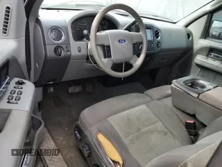 2005 Ford F-150 XLT with VIN 1FTPX14565FA16911, listed as a Copart auction lot 47700005 with 194,819 mi miles and Salvage Title. Bid and sale history available at carsss.com. Image 8.