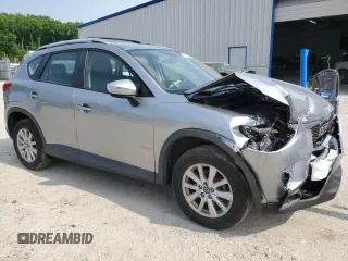 2015 Mazda CX-5 Sport with VIN JM3KE2BE4F0533273, listed as a Copart auction lot 60307795 with 120,484 mi miles and Salvage title. Bid and sale history available at DreamBid. Image 4.
