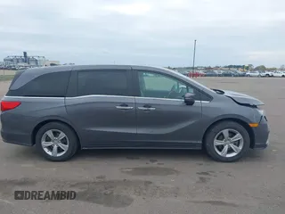 2018 Honda Odyssey EX-L z VIN 5FNRL6H72JB090127, wystawiony jako IAAI lot #42167788 z przebiegiem 114 984 mil mil oraz . Historia ofert i sprzedaży dostępna na DreamBid. Obrazek 13.
