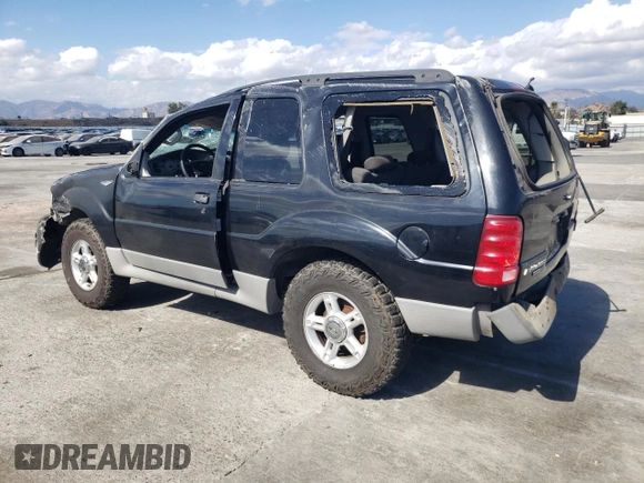 2003 Ford Explorer Sport XLS z VIN 1FMYU60E93UC12832, wystawiony jako Copart lot #71596394 z przebiegiem 197 215 mil mil oraz Szkody całkowita. Historia ofert i sprzedaży dostępna na DreamBid. Obrazek 2.