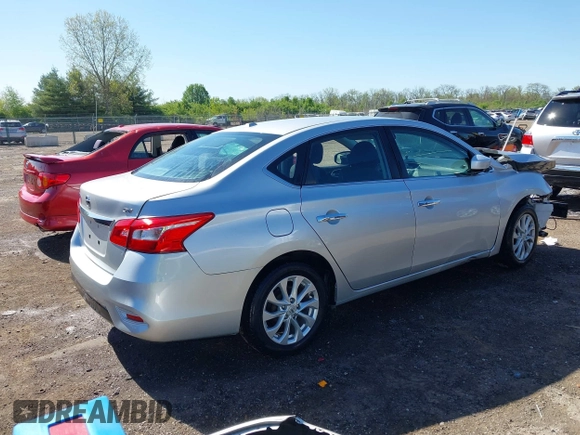 2018 Nissan Sentra S with VIN 3N1AB7AP1JY247296, listed as a IAAI auction lot 42099910 with 102,127 mi miles and . Bid and sale history available at DreamBid. Image 4.