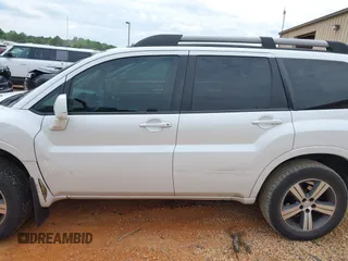 2011 Mitsubishi Endeavor z VIN 4A4JM3AS2BE037110, wystawiony jako IAAI lot #42106914 z przebiegiem 160 327 mil mil oraz . Historia ofert i sprzedaży dostępna na DreamBid. Obrazek 14.